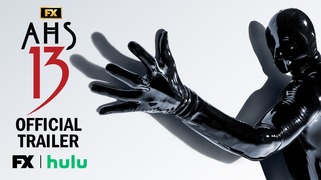 FX's American Horror Story: 13 official trailer image showing a black-clad figure reaching toward the viewer