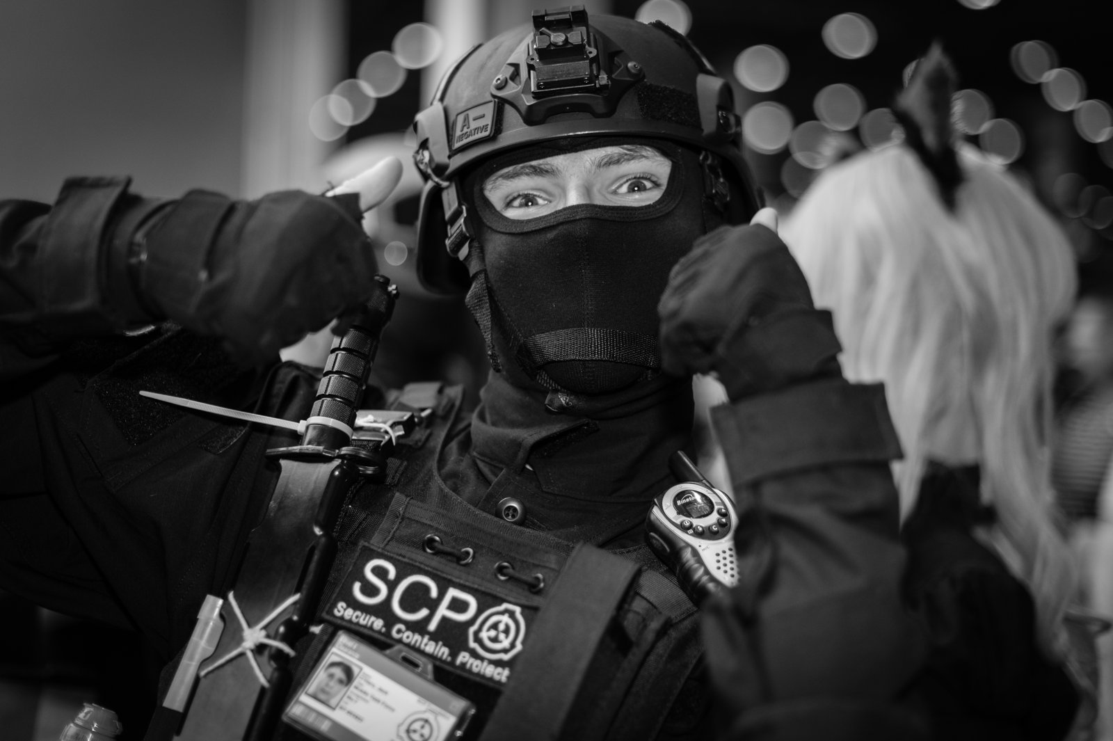 A cosplayer dressed as an SCP Foundation Mobile Task Force operative at Comic Con London in 2016
