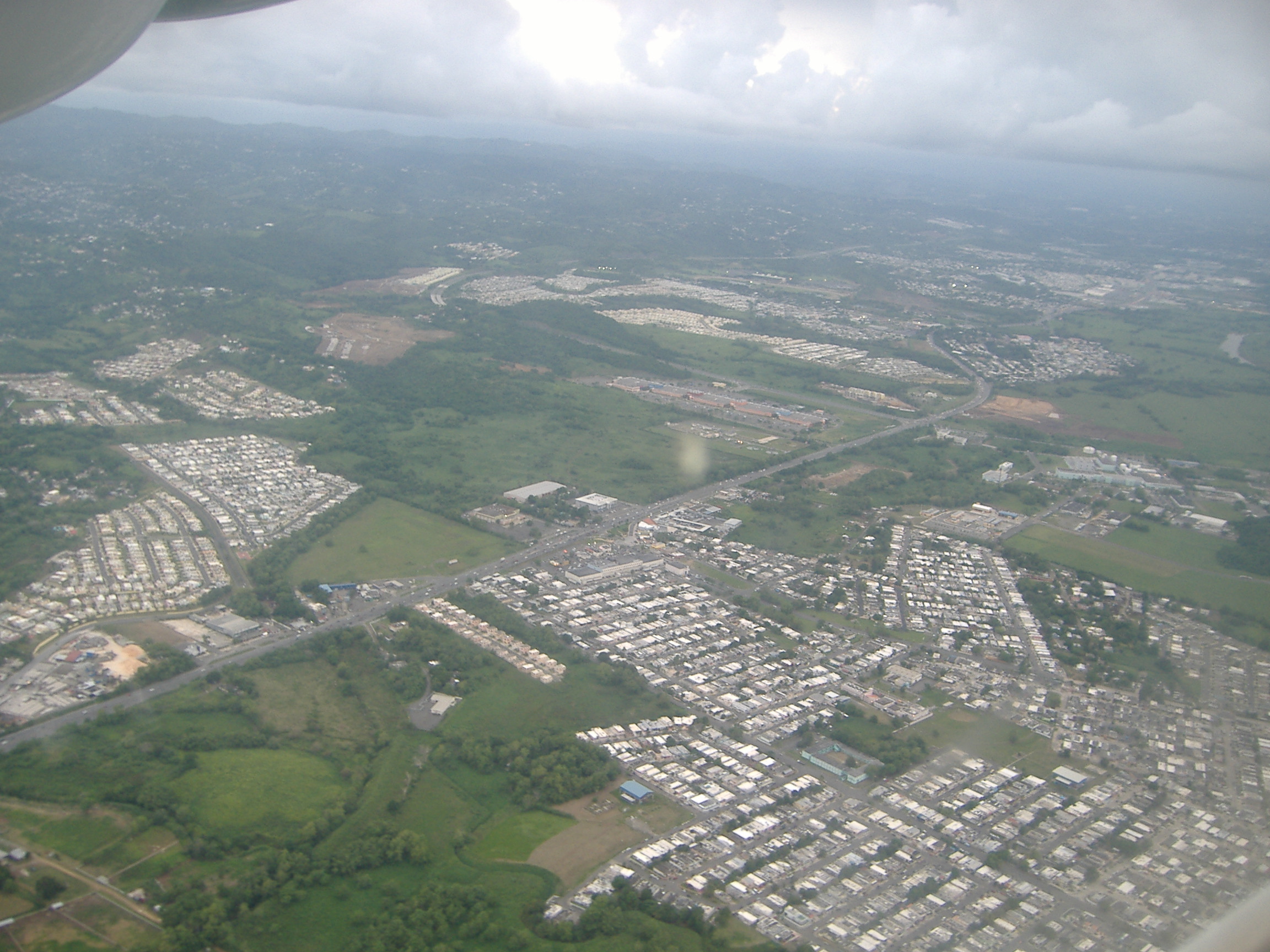 Aerial view of Canovanas, Puerto Rico, where the 1995 Chupacabra sighting that shaped the legend's appearance occurred