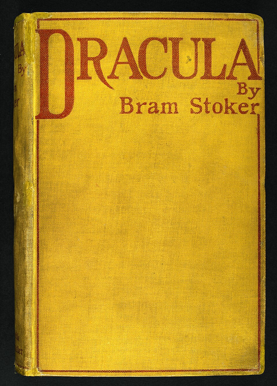 Yellow cloth cover of the 1897 first edition of Dracula by Bram Stoker, published by Archibald Constable and Company