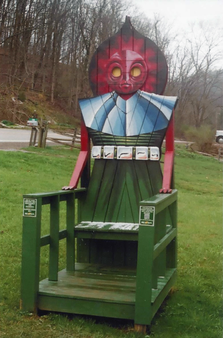 A tall chair welcoming visitors on the town hall lawn in Flatwoods, West Virginia, near the site of the 1952 sighting