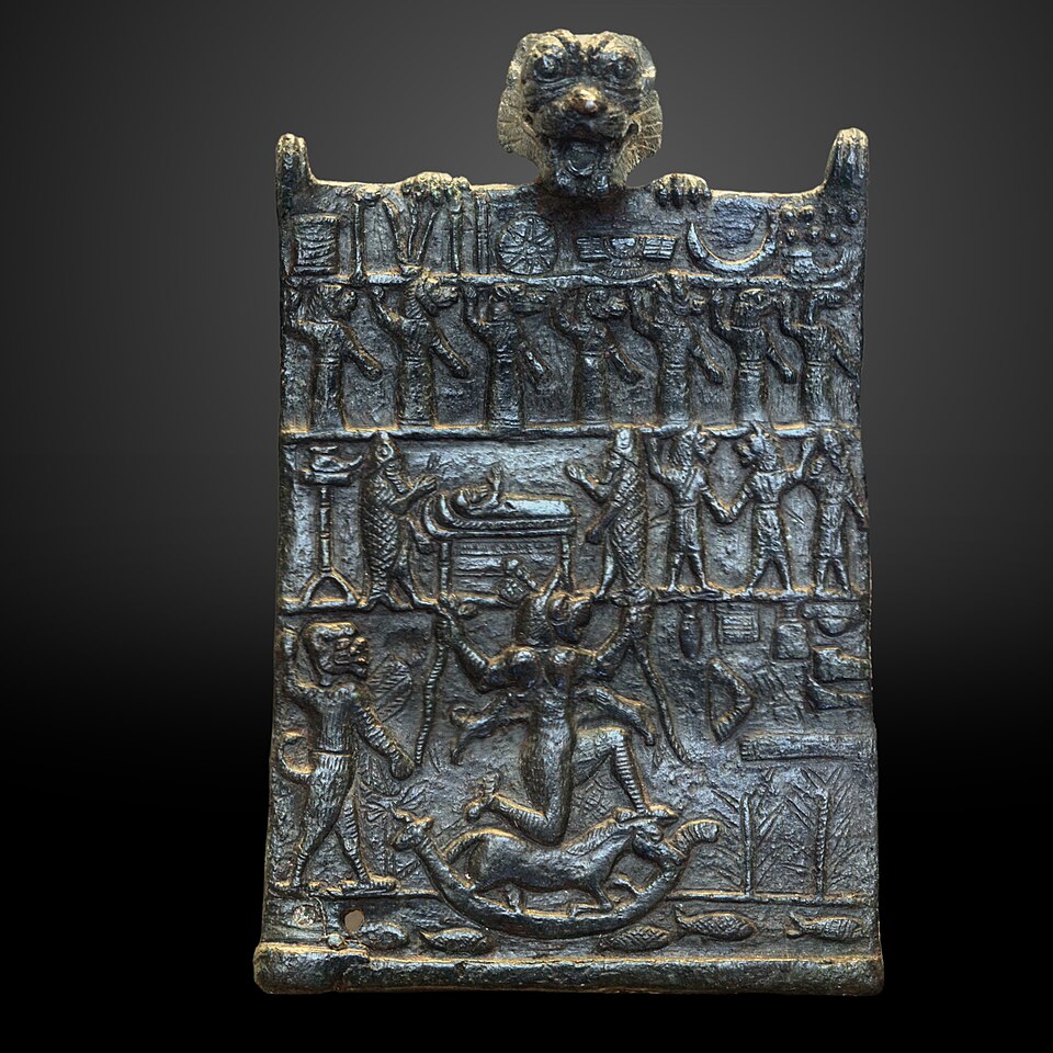 Bronze apotropaic plaque showing Lamashtu among registers of gods and demons, topped by a lion-like head, from the Louvre's Mesopotamian collection