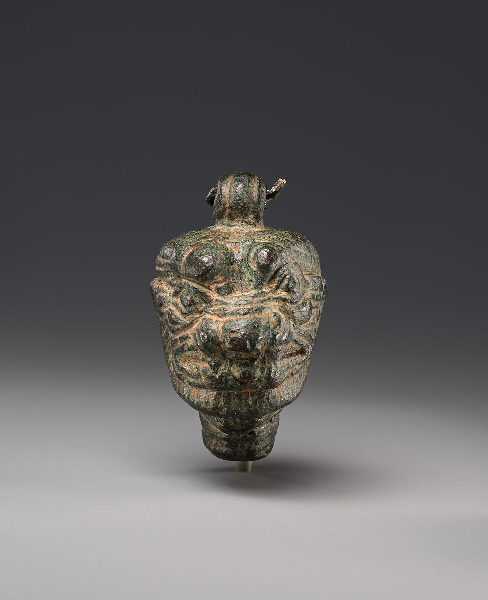 Neo-Assyrian bronze pendant in the form of the head of Pazuzu