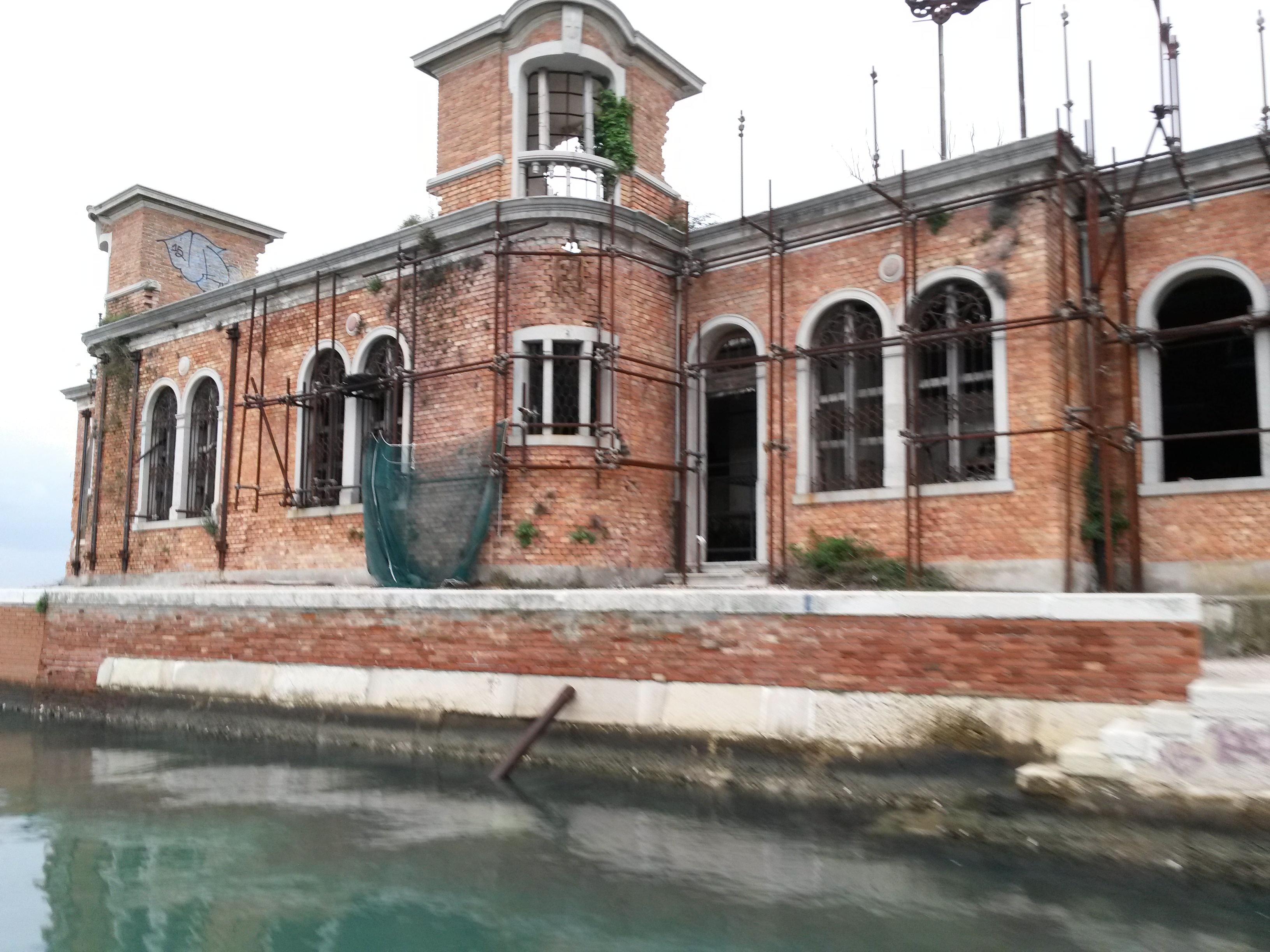View across a water channel on Poveglia Island in the Venetian Lagoon