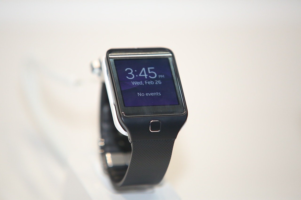 A generic smartwatch photographed on a light surface; contextual wearable technology, not a ScareScore interface