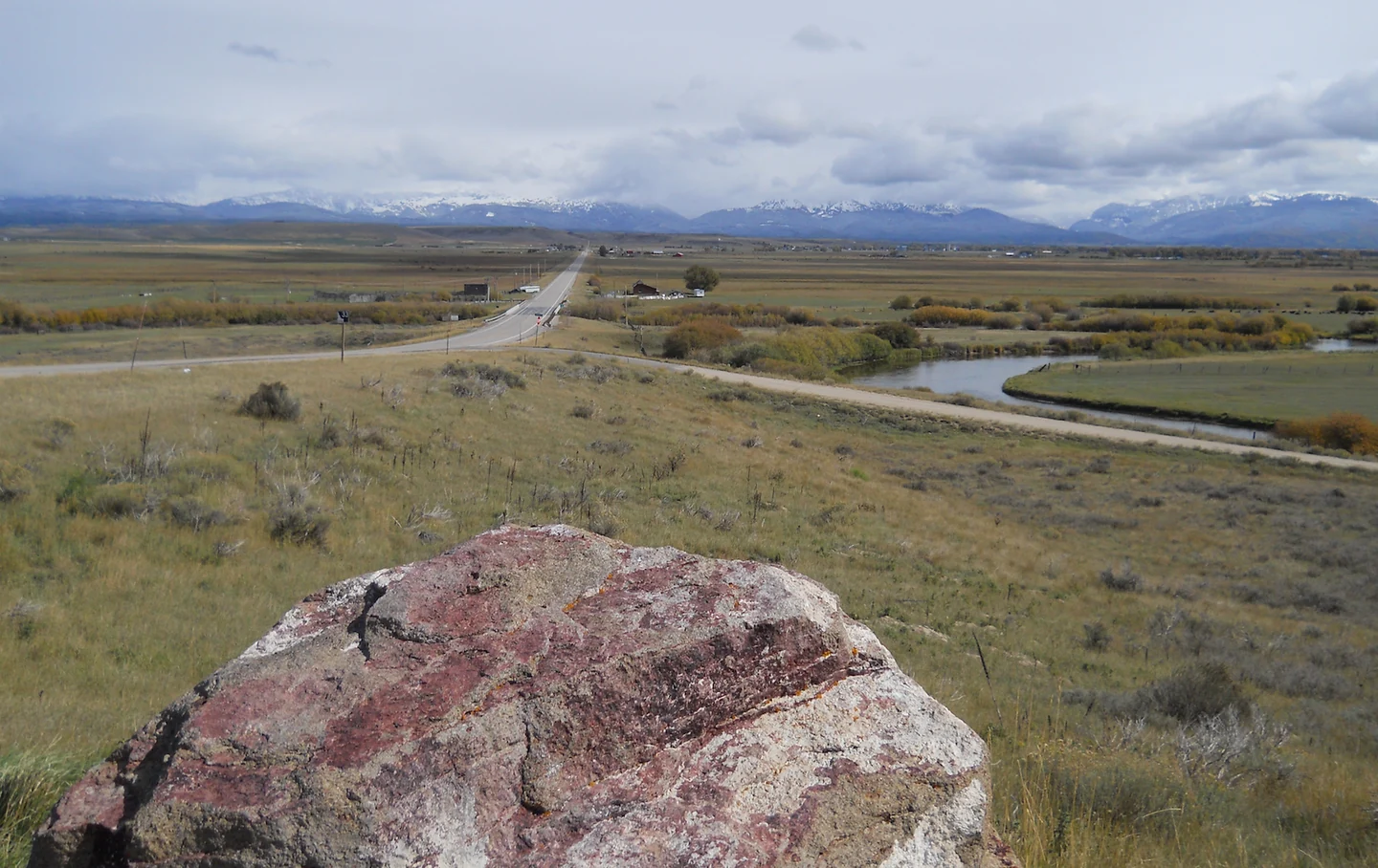 An actual view of Idaho's Teton Valley, the real geographical region used as a fictional setting in the original haunted-ranch story
