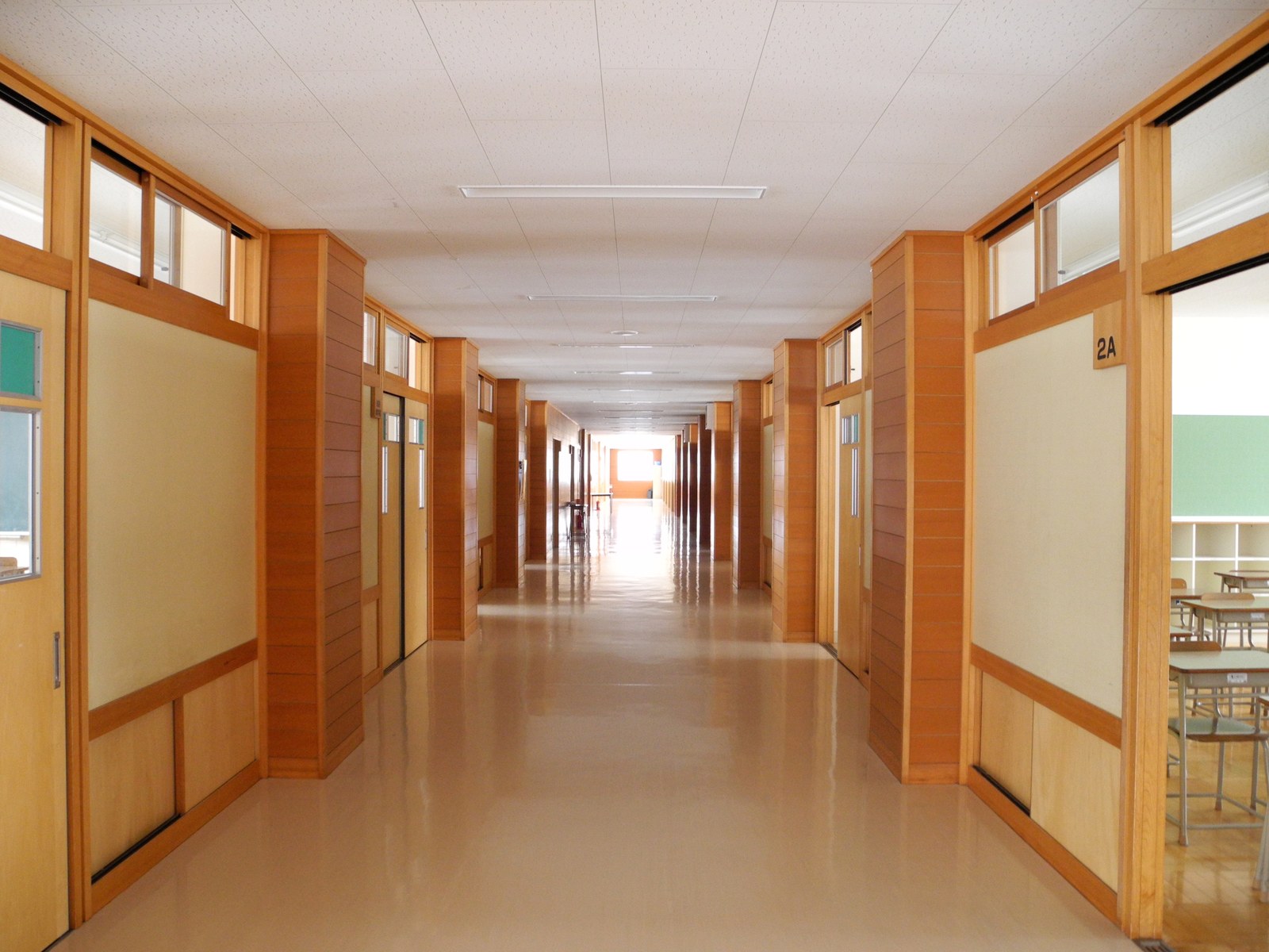 A real second-floor corridor at Chokai Junior High School in Akita, Japan; architectural context only, not Nishikawa High School or a Signal Veil location
