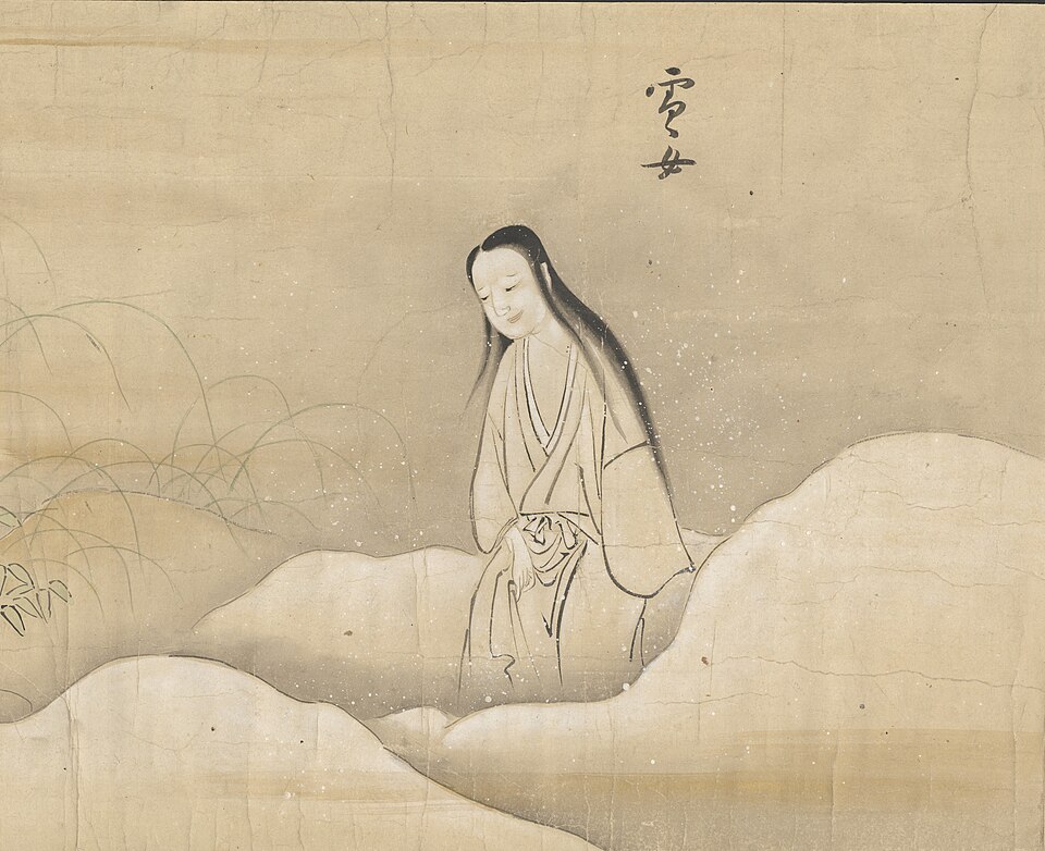 Painted hanging scroll of a snow woman figure labeled with the characters for Yuki-Onna, kneeling among snow-covered hills